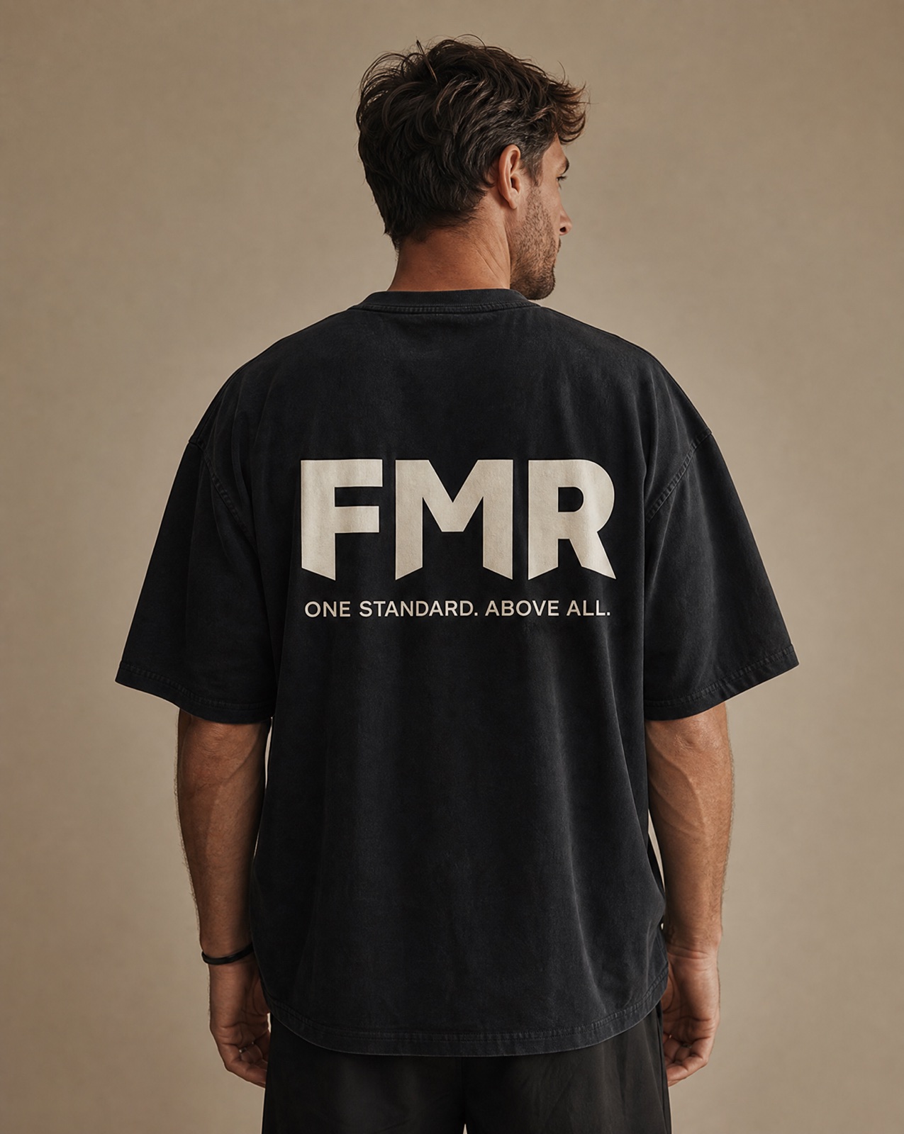 FMR Standard Tee back print — One Standard. Above All.