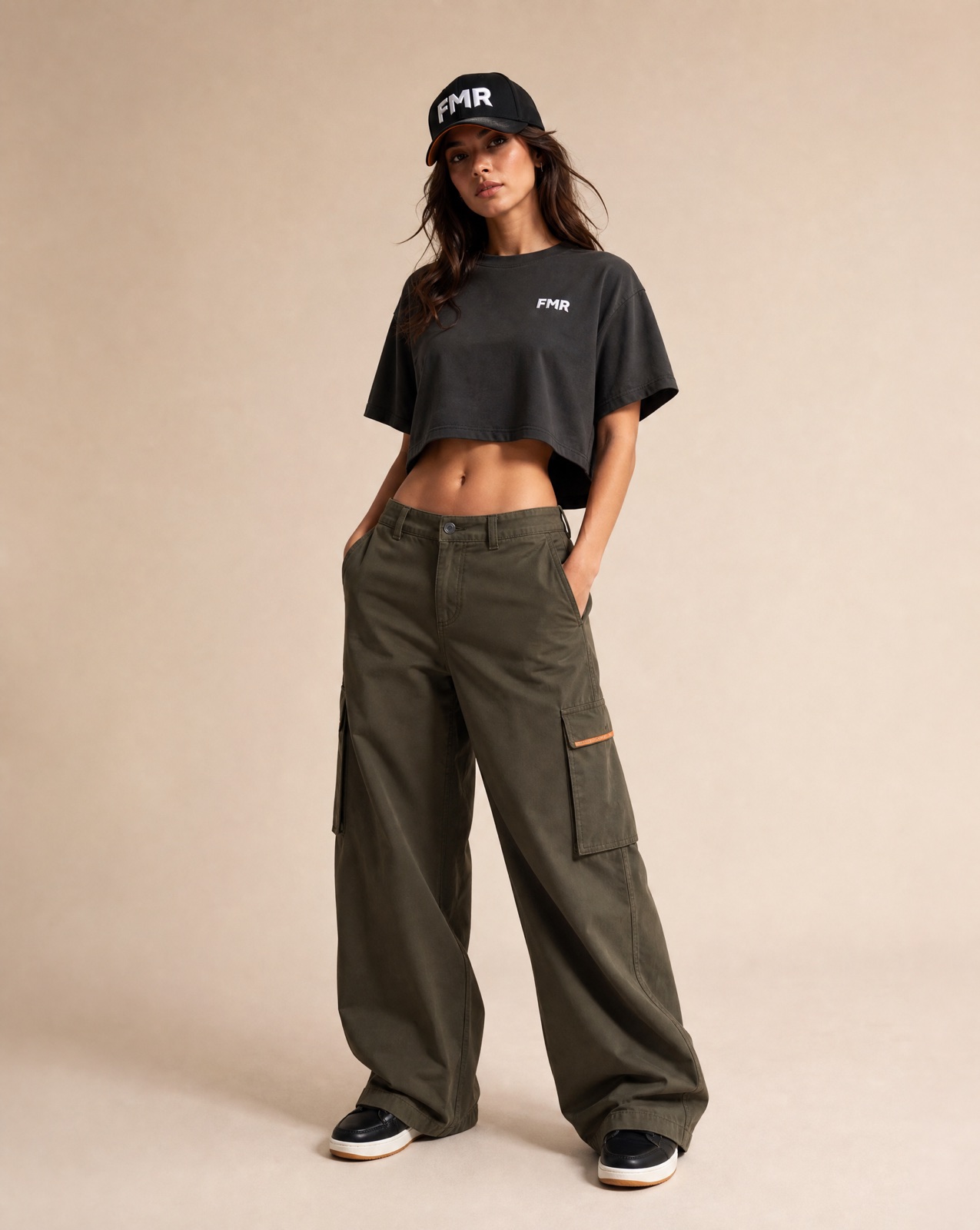 FMR crop tee, cargo and cap on a female model